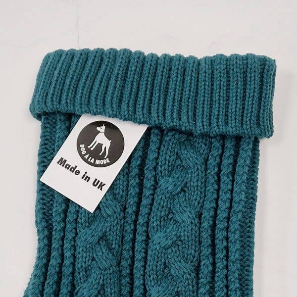 Top view of the Cable Knitted Dog Turquoise Jumper highlighting its texture and smooth finish.