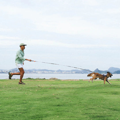 A lightweight yet strong long dog leash designed for dogs of all sizes, providing durability, comfort, and security during daily walks and training.