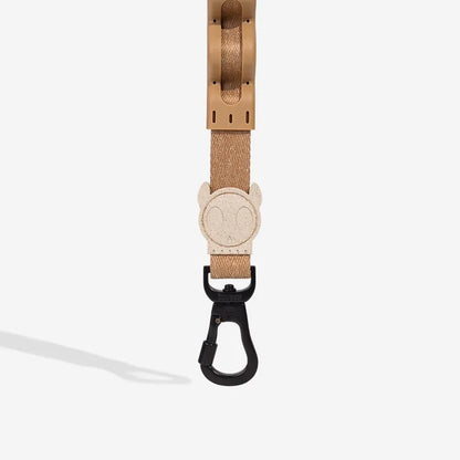 Top view of the Ruff-Leash 2.0 Dune displaying its smooth texture and ergonomic handle