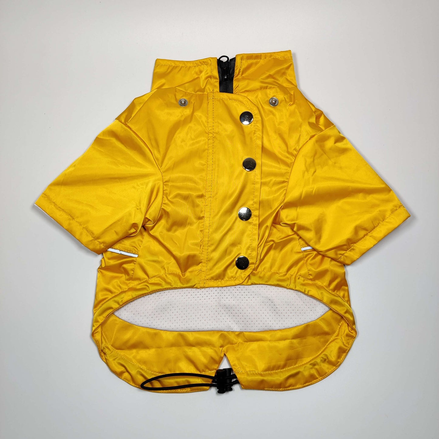 View of reflective strips on the Yellow 'Buddy' Dog Raincoat for safety and visibility.

